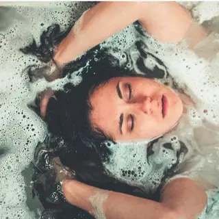 Person Relaxing in the Mineral Bath